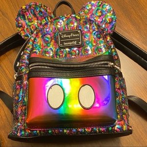 Disney Loungefly rainbow mini backpack.
